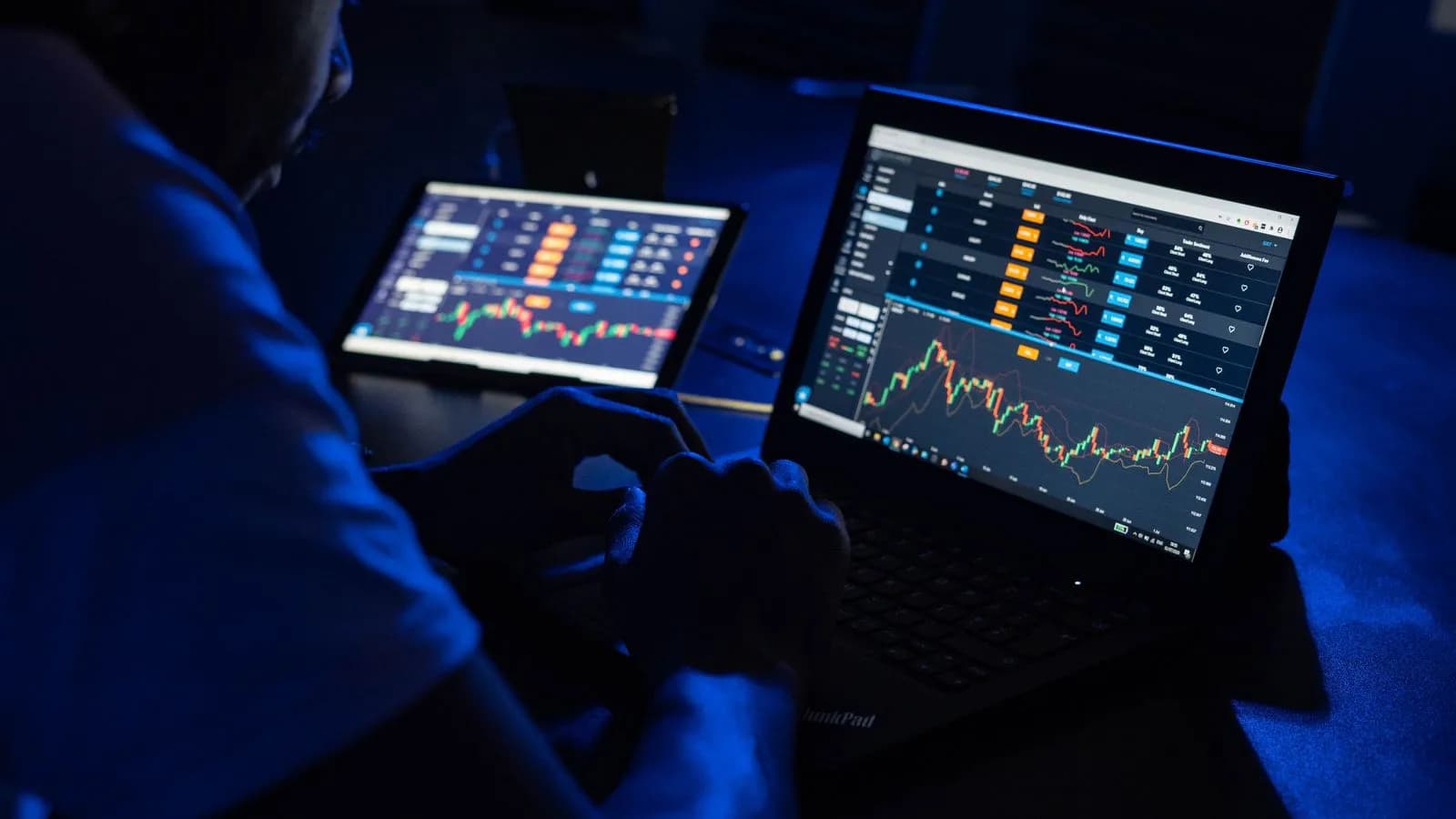 Marketer reviewing dark analytics dashboards where intent signals are scored and prioritized